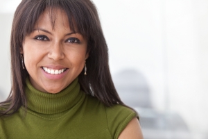 black business woman smiling at the office