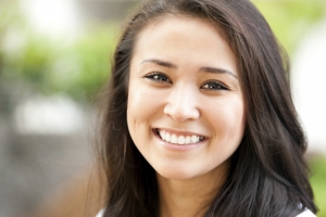 Closeup of a smiling young girl looking at camera