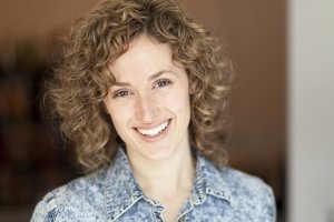 Closeup of a woman smiling at the camera